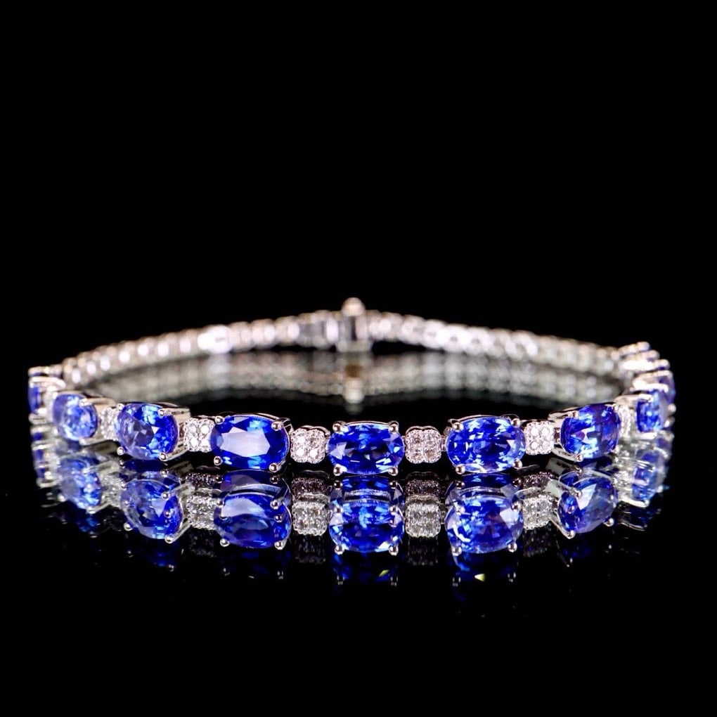 14k Gold 5.55 Ctw Natural Sapphire & Diamond Bracelet: Ref:230941092 // gold content:14k gold // main gemstone:sapphire // shape:oval // carat weight:5. 40ct // color:cornflower blue // treatment:natural // // adjacent gemstone 2 : diamond //
