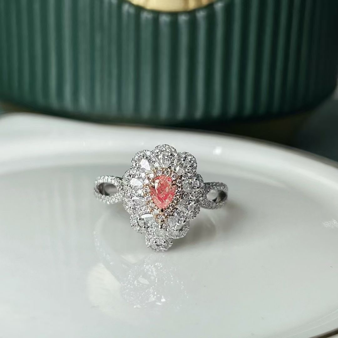 14k Gold 1.01 Ctw Natural Pink Diamond & Diamond Ring: Ref:230941107 // gold content:14k gold // ring size:7. 25us // // main gemstone:pink diamond // shape:pear // carat weight:0. 20ct // color:pink // treatment:natural // // adjacent gemstone 2 :
