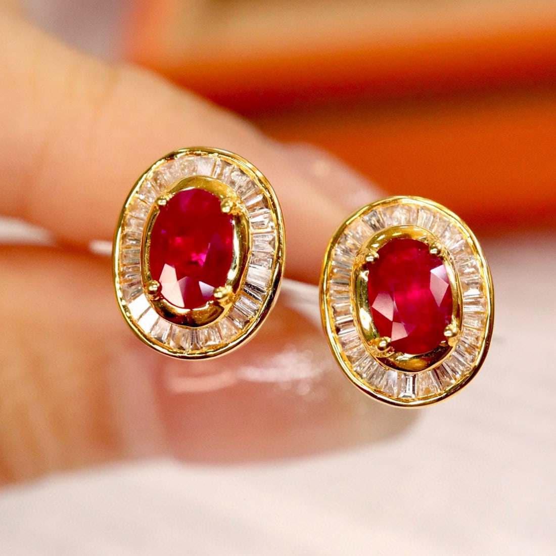 14k Gold 1.57 Ctw Natural Ruby & Diamond Earrings: Ref:230941134 // gold content:14k gold // main gemstone:ruby // shape:oval // carat weight:1. 3ct // color:pigeonblood red // treatment:natural // // adjacent gemstone 2 : diamond // shape:baguette //