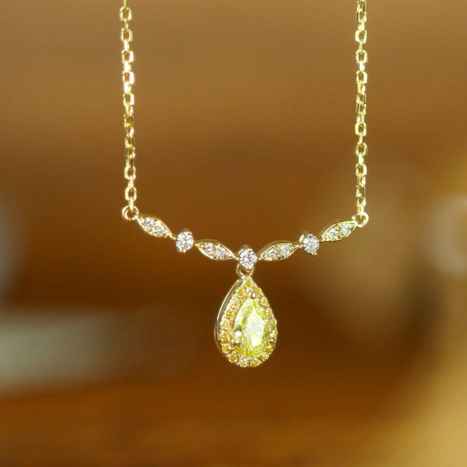 14k Gold 0.43 Ctw Natural Yellow Diamond & Diamond Necklace: Ref:230941140 // gold content:14k gold // main gemstone:yellow diamond // shape:pear // carat weight:0. 28ct // color:yellow // treatment:natural // // adjacent gemstone 2 : diamond // shape:round