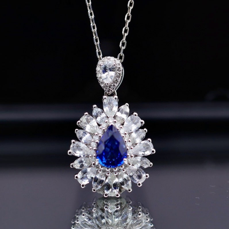 14k Gold 3.03 Ctw Natural Sapphire & Sapphire Pendant( Without Chain ): Ref:230941148 // gold content:14k gold // main gemstone:sapphire // shape:pear // carat weight:0. 88ct // color:blue // treatment:natural // // adjacent gemstone 2 : sapphire // shape:multiply //