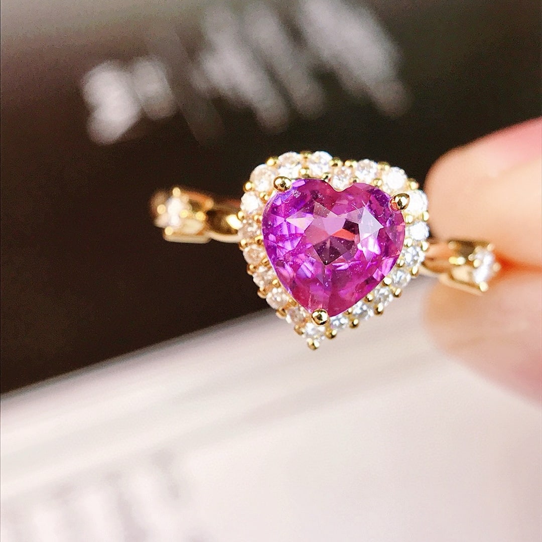 14k Gold 1.25 Ctw Natural Padparadscha Sapphire & Diamond Ring: Ref:230941214 // gold content:14k gold // ring size:7. 25us // // main gemstone:padparadscha sapphire // shape:heart // carat weight:1. 07ct // color:orangish pink // treatment:natural // // adjacent