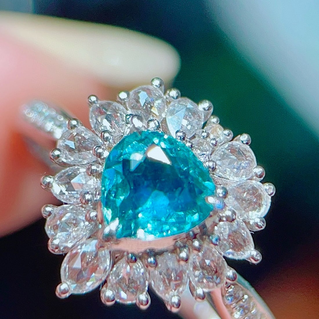 14k Gold 0.88 Ctw Natural Paraiba Tourmaline & Diamond Ring: Ref:230941224 // gold content:14k gold // ring size:7. 25us // // main gemstone:paraiba tourmaline // shape:pear // carat weight:0. 51ct // color:blue // treatment:natural // // adjacent gemstone