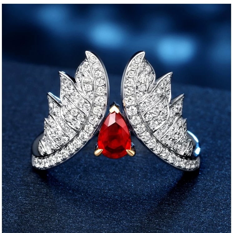 14k Gold 0.89 Ctw Natural Ruby & Diamond Ring: Ref:230942006 // gold content:14k gold // ring size:7. 25us // // main gemstone:ruby // shape:pear // carat weight:0. 44ct // color:pigeonblood red // treatment:natural // // adjacent gemstone 2 :