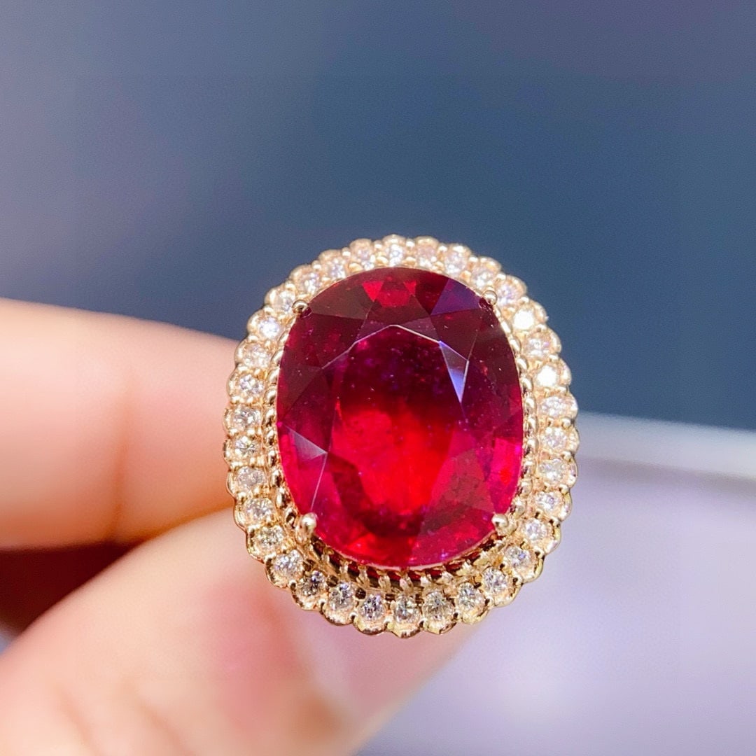 14k Gold 7.4 Ct Natural Tourmaline & Diamond Ring: Ref:230942038 // gold content:14k gold // ring size:7. 25us // // main gemstone:tourmaline // shape:oval // carat weight:7. 4ct // color:red // treatment:natural // // adjacent gemstone 2 : diamond //