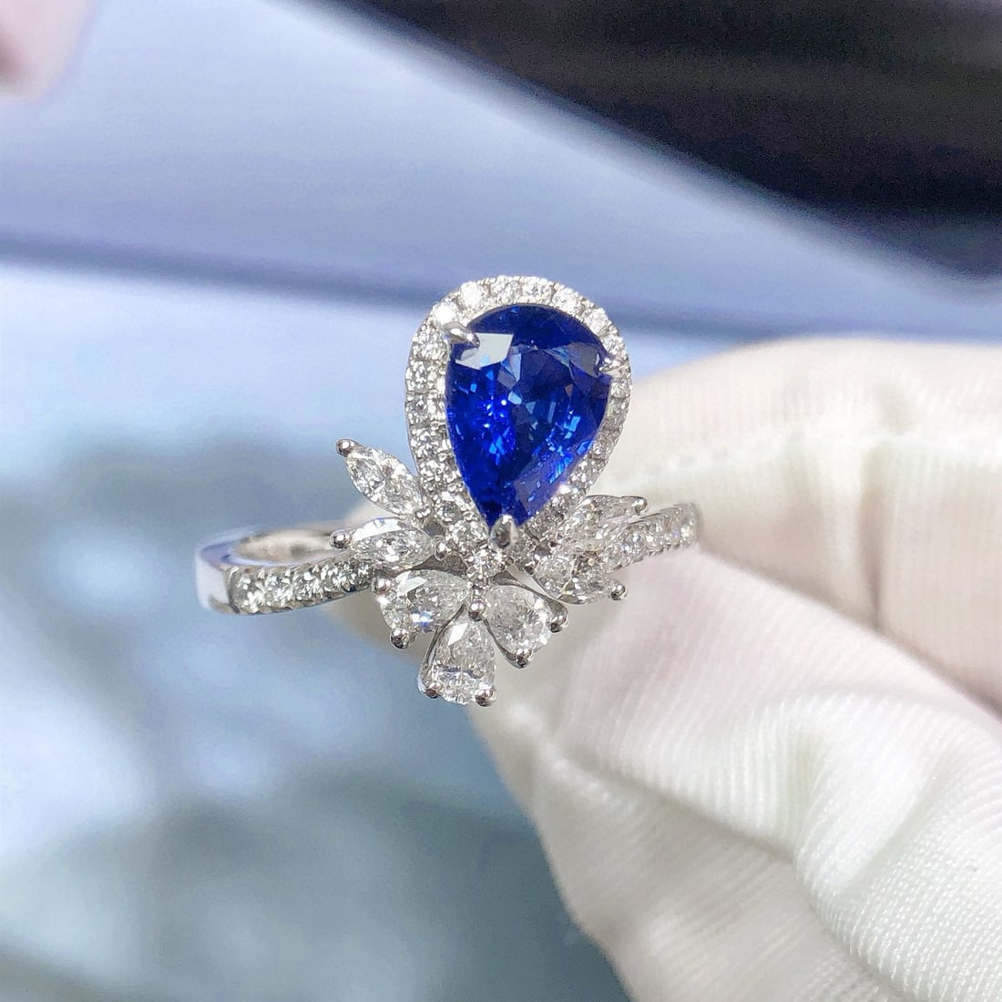 14k Gold 1.86 Ctw Natural Sapphire & Diamond Ring: Ref:230942119 // gold content:14k gold // ring size:7. 25us // // main gemstone:sapphire // shape:pear // carat weight:1. 31ct // color:blue // treatment:natural // // adjacent gemstone 2 :