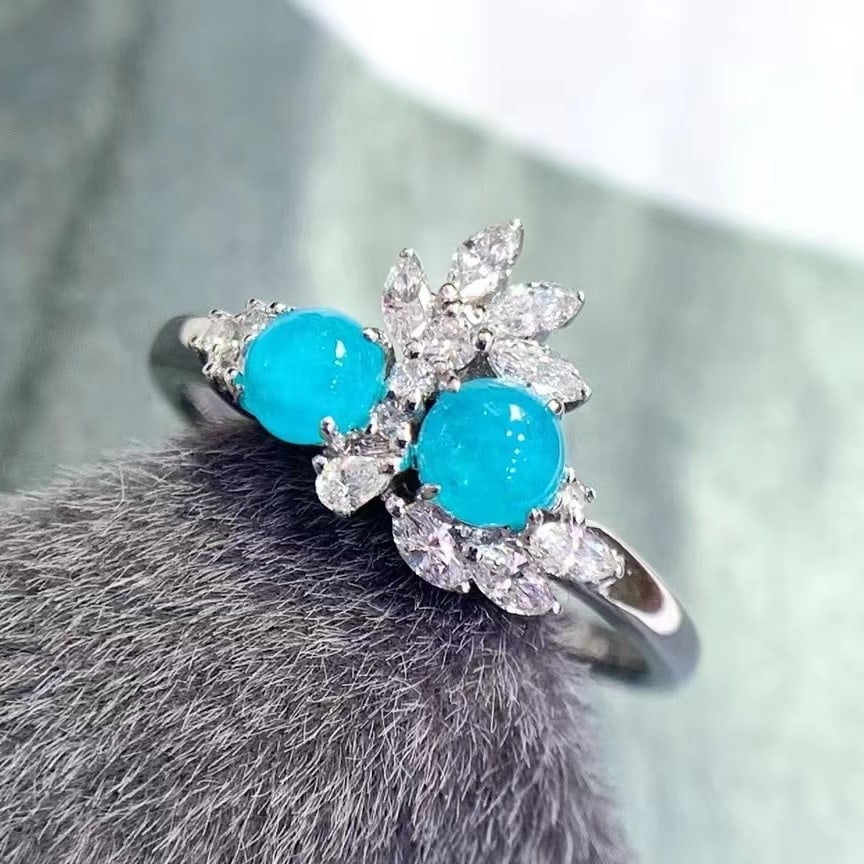 14k Gold 0.93 Ctw Natural Paraiba Tourmaline & Diamond Ring: Ref:230942240 // gold content:14k gold // ring size:7. 25us // // main gemstone:paraiba tourmaline // shape:round // carat weight:0. 56ct // color:blue // treatment:natural // cut grade:g // // adjace