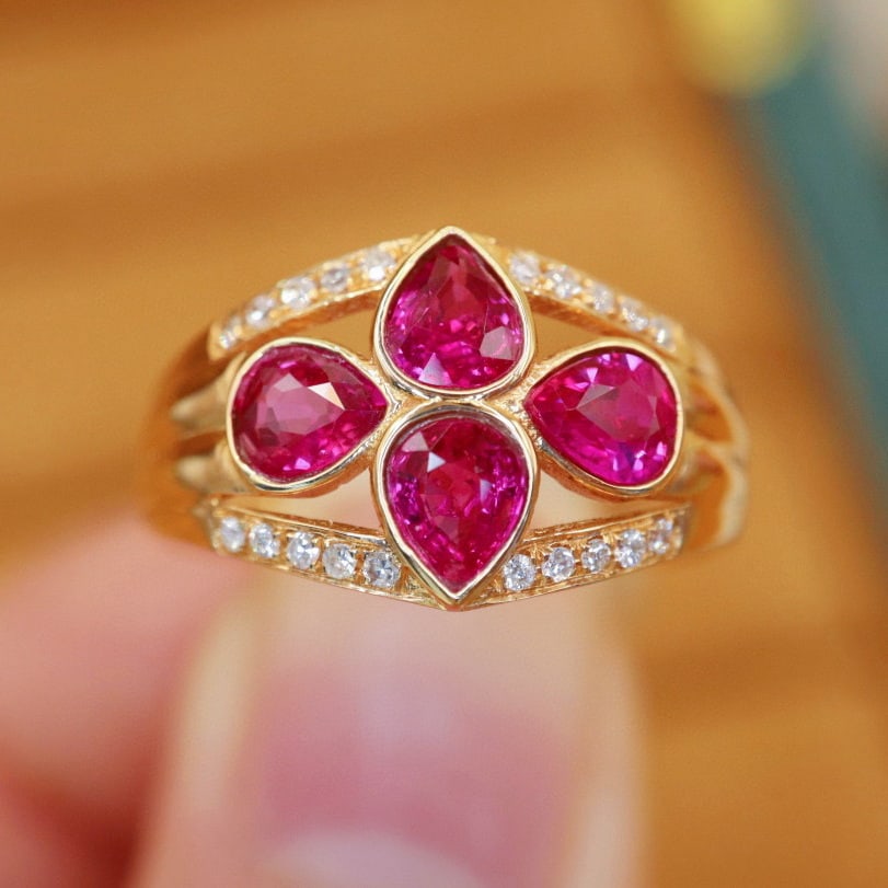 14k Gold 1.40 Ctw Natural Ruby & Diamond Ring: Ref:230942365 // gold content:14k gold // ring size:7. 25us // // main gemstone:ruby // shape:pear // carat weight:1. 30ct // color:red // treatment:natural // // adjacent gemstone 2 : diamond //