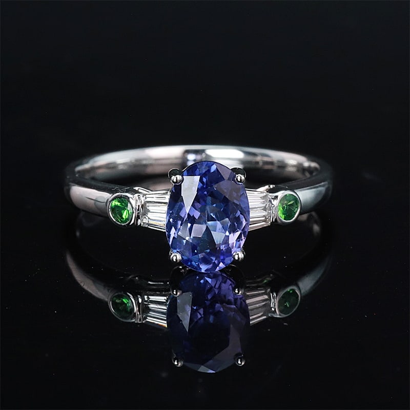 14k Gold 1.51 Ctw Natural Tanzanite & Diamond Ring: Ref:230943055 // gold content:14k gold // ring size:7. 25us // // main gemstone:tanzanite // shape:oval // carat weight:1. 45ct // color:blue // treatment:natural // // adjacent gemstone 2 : diamond /