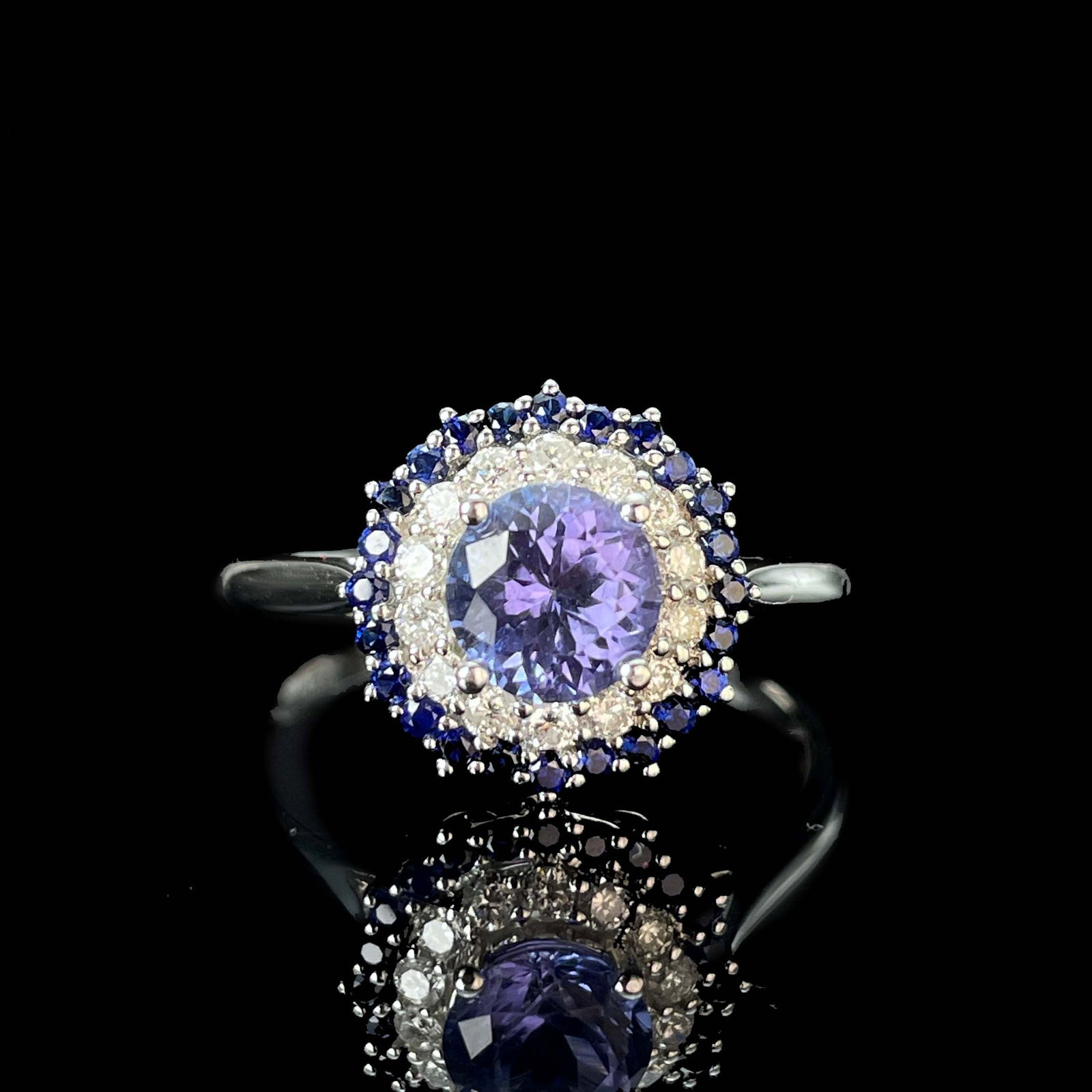 14k Gold 1.06 Ctw Natural Tanzanite & Diamond Ring: Ref:230943059 // gold content:14k gold // ring size:7. 25us // // main gemstone:tanzanite // shape:round // carat weight:0. 76ct // color:blue // treatment:natural // cut grade:g // // adjacent