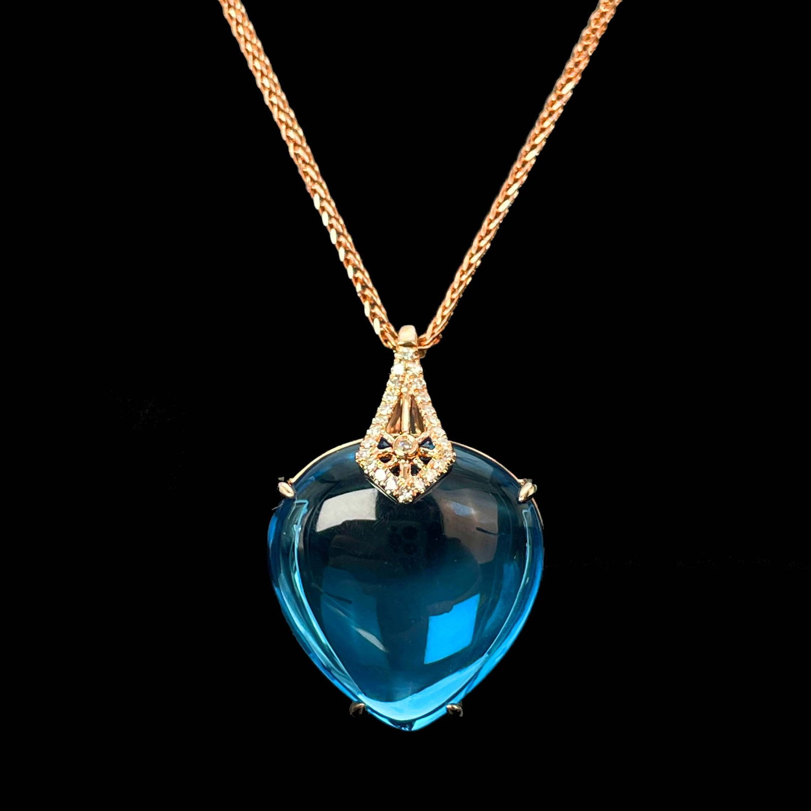14k Gold 21.69 Ctw Natural Topaz & Diamond Pendant( Without Chain ): Ref:230943223 // gold content:14k gold // main gemstone:topaz // shape:pear // carat weight:21. 62ct // color:blue // treatment:natural // // adjacent gemstone 2 : diamond // number of stones:25 // sh
