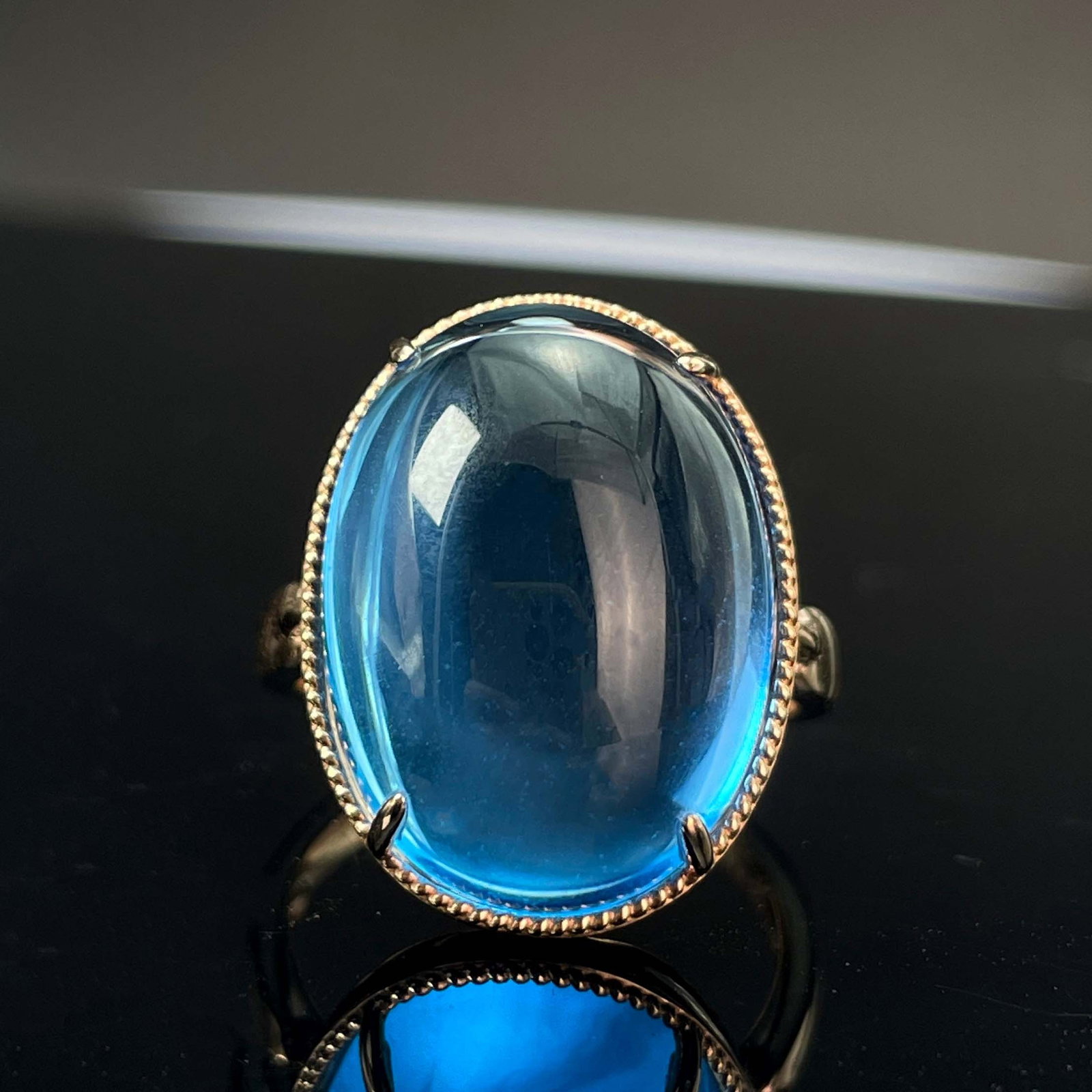 14k Gold 15.52 Ct Natural Topaz Ring: Ref:230943298 // gold content:14k gold // ring size:7. 25us // // main gemstone:topaz // shape:oval // carat weight:15. 52ct // color:blue // treatment:natural // Low Estimate: 3300High Estimate: