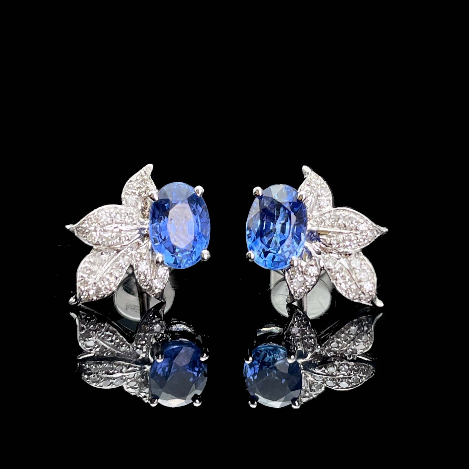 14k Gold 1.35 Ctw Natural Sapphire & Diamond Earrings: Ref:230943366 // gold content:14k gold // main gemstone:sapphire // shape:oval // carat weight:1. 20ct // color:blue // treatment:natural // // adjacent gemstone 2 : diamond // shape:round // carat