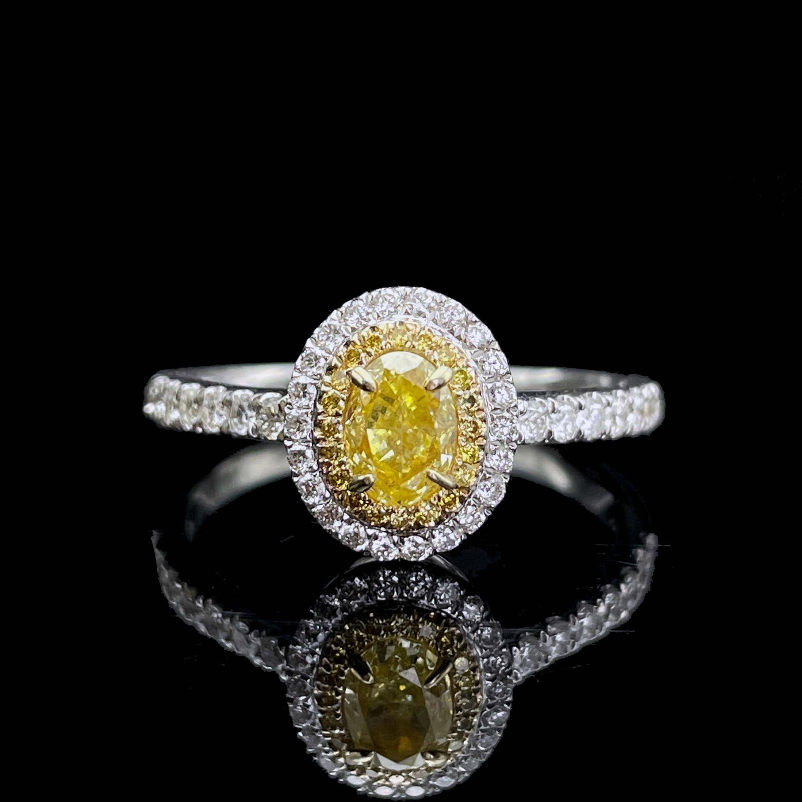 14k Gold 0.77 Ctw Natural Yellow Diamond & Diamond Ring: Ref:230943367 // gold content:14k gold // ring size:7. 25us // // main gemstone:yellow diamond // shape:oval // carat weight:0. 50ct // color:yellow // treatment:natural // // adjacent gemstone 2