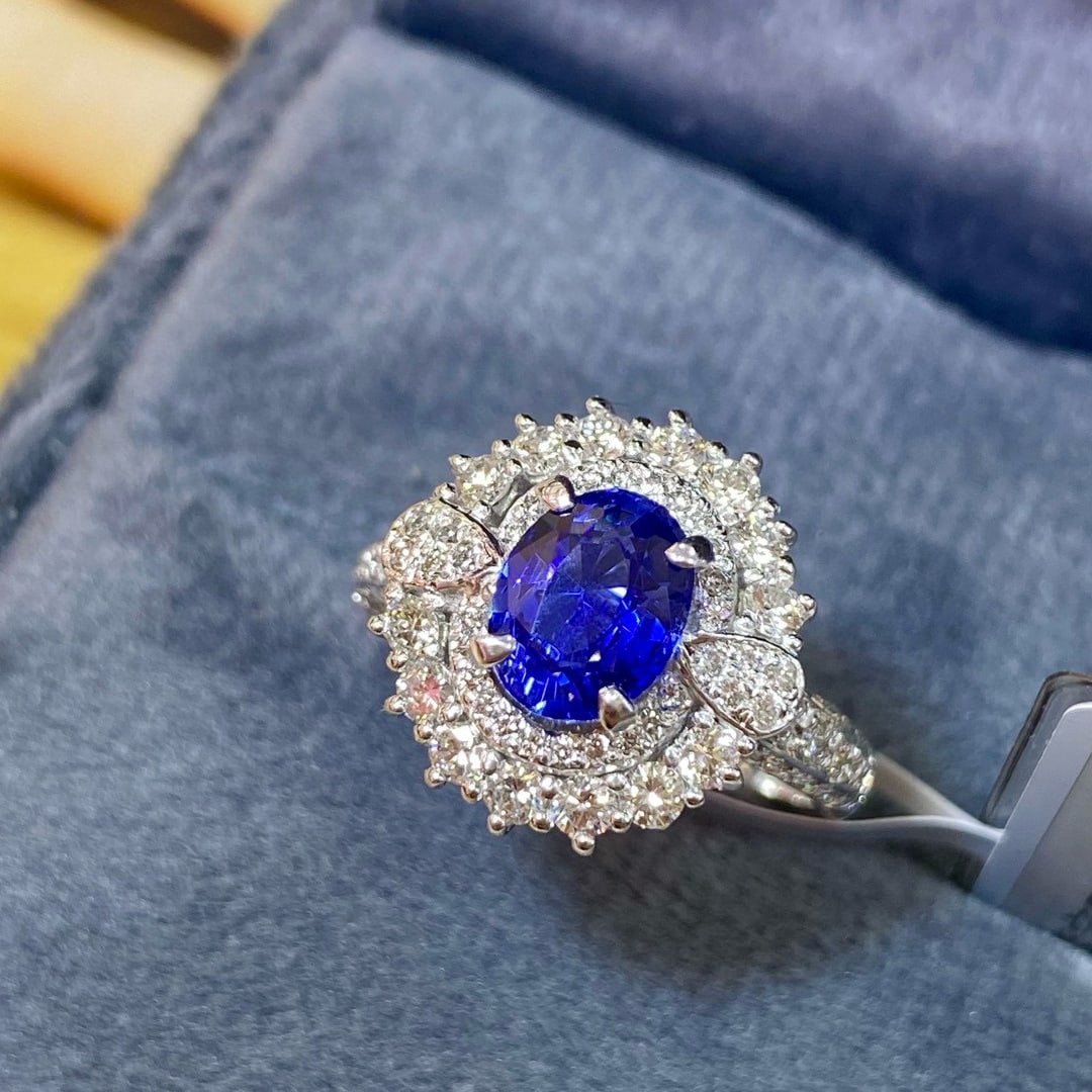 14k Gold 2.22 Ctw Vivid Blue Natural Sapphire & Diamond Ring: Ref:230944018 // gold content:14k gold // ring size:7. 25us // // main gemstone:sapphire // shape:oval // carat weight:1. 49ct // color:vivid blue // treatment:natural // // adjacent gemstone 2 :