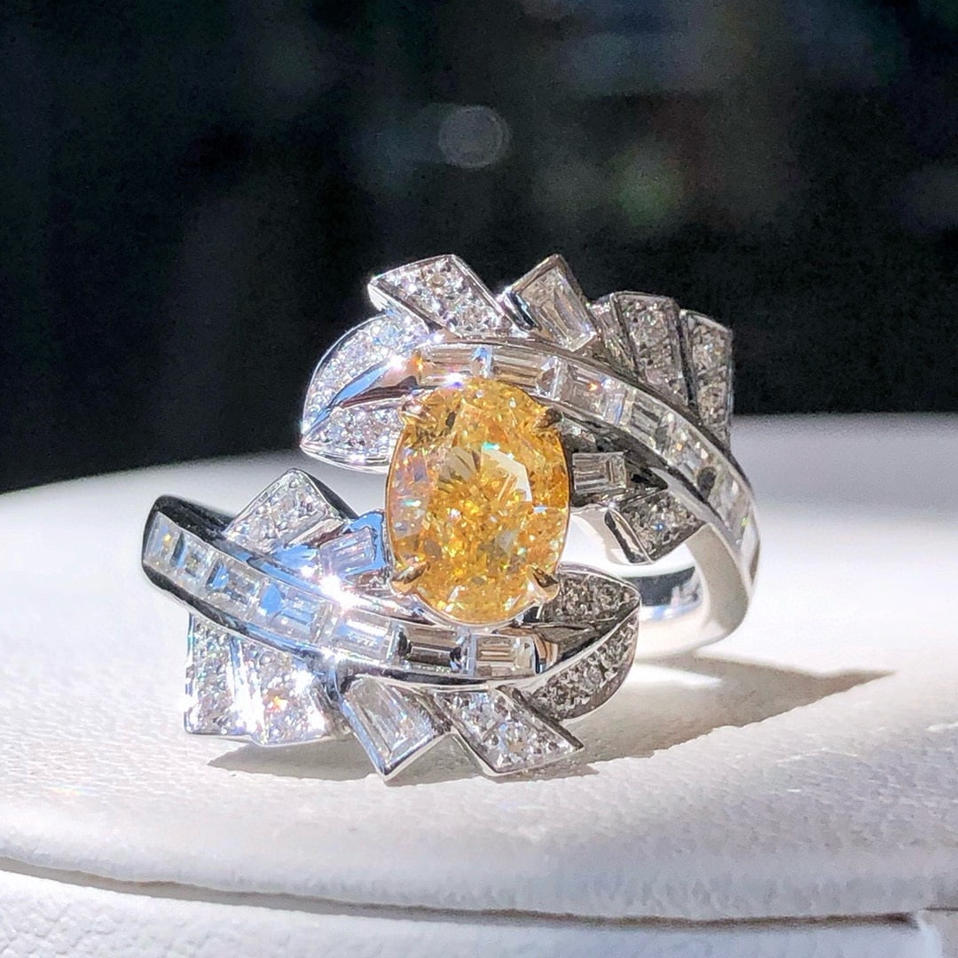 14k Gold 1.92 Ctw Natural Yellow Diamond & Diamond Ring: Ref:230944180 // gold content:14k gold // ring size:7. 25us // // main gemstone:yellow diamond // shape:oval // carat weight:1. 07ct // color:yellow // treatment:natural // // adjacent gemstone 2