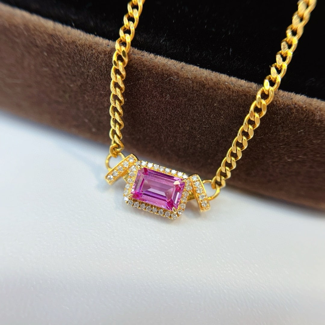 14k Gold 0.75 Ct Natural Padparadscha Sapphire & Diamond Necklace: Ref:230944200 // gold content:14k gold // main gemstone:padparadscha sapphire // shape:octagonal // carat weight:0. 75ct // color:orangish pink // treatment:natural // // adjacent gemstone 2 : diamond