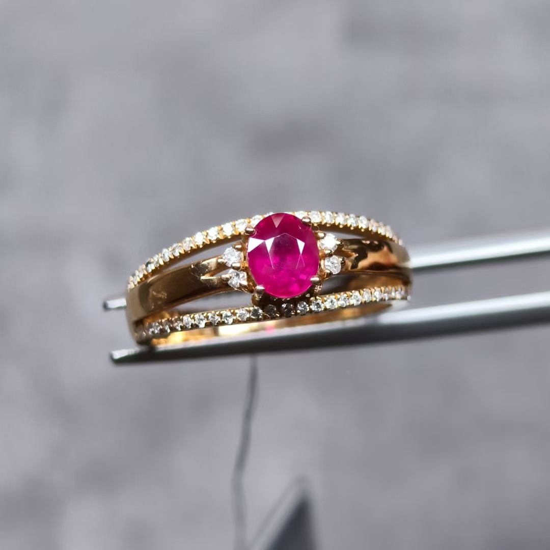 14k Gold 0.93 Ctw Natural Ruby & Diamond Ring: Ref:230944220 // gold content:14k gold // ring size:7. 25us // // main gemstone:ruby // shape:oval // carat weight:0. 73ct // color:red // treatment:natural // // adjacent gemstone 2 : diamond //