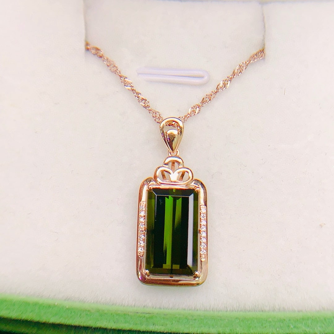 14k Gold 4.75 Ctw Natural Tourmaline & Diamond Pendant( Without Chain ): Ref:230944231 // gold content:14k gold // main gemstone:tourmaline // shape:octagonal // carat weight:4. 7ct // color:green // treatment:natural // // adjacent gemstone 2 : diamond // number of stones