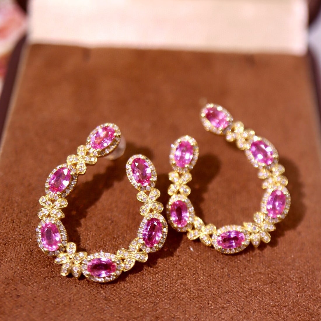 14k Gold 5.30 Ctw Natural Padparadscha Sapphire & Diamond Earrings: Ref:230944323 // gold content:14k gold // main gemstone:padparadscha sapphire // shape:oval // carat weight:4. 20ct // color:orangish pink // treatment:natural // // adjacent gemstone 2 : diamond