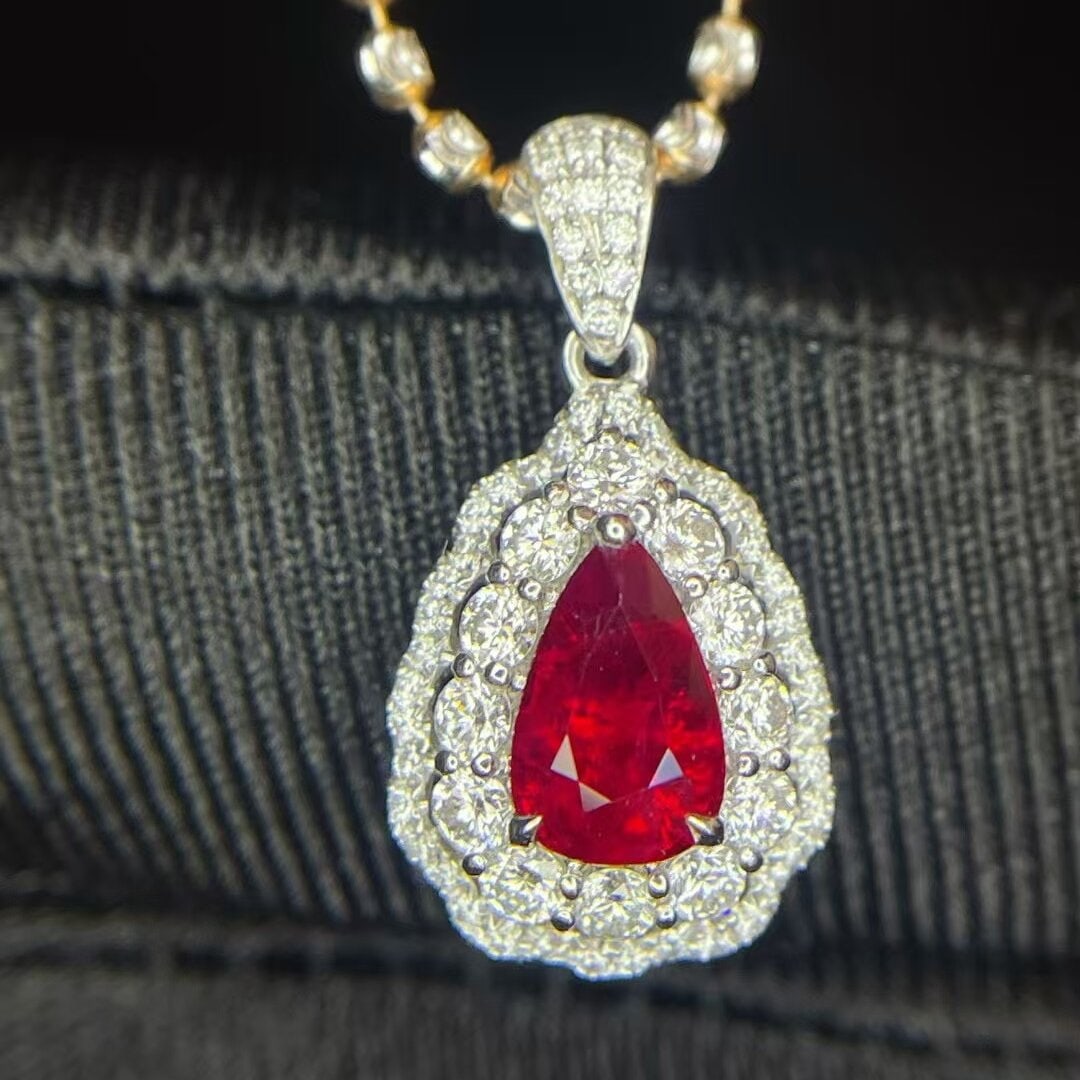 14k Gold 1.51 Ctw Natural Ruby & Diamond Pendant( Without Chain ): Ref:230944375 // gold content:14k gold // main gemstone:ruby // shape:pear // carat weight:1ct // color:pigeonblood red // treatment:natural // // adjacent gemstone 2 : diamond // shape:round // carat