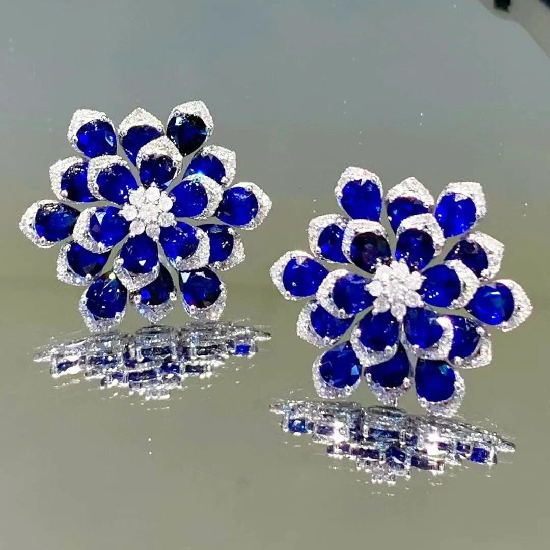 14k Gold 15.3 Ct Natural Sapphire & Diamond Earrings: Ref:230945004 // gold content:14k gold // main gemstone:sapphire // shape:pear // carat weight:15. 3ct // color:royal blue // treatment:natural // // adjacent gemstone 2 : diamond // number of stones: