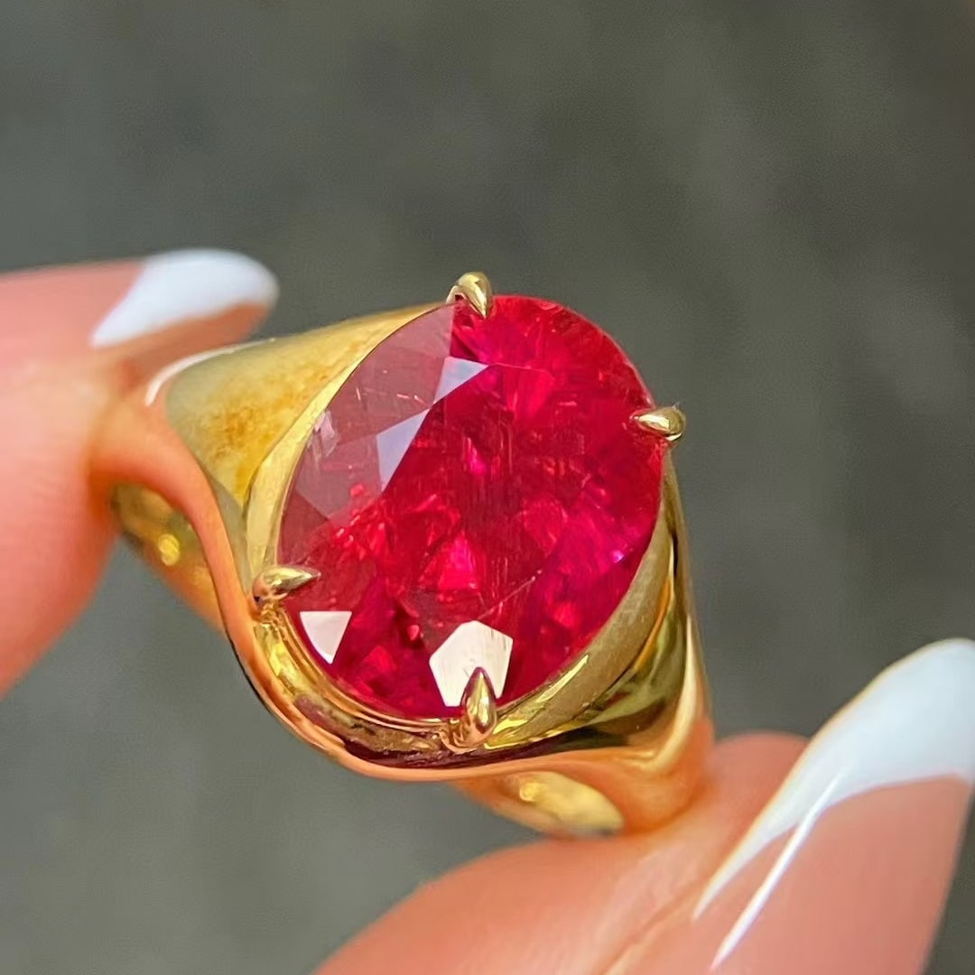 14k Gold 4.60 Ct Natural Tourmaline Ring: Ref:230945017 // gold content:14k gold // ring size:7. 25us // // main gemstone:tourmaline // shape:oval // carat weight:4. 60ct // color:red // treatment:natural // Low Estimate: 4800Condition: