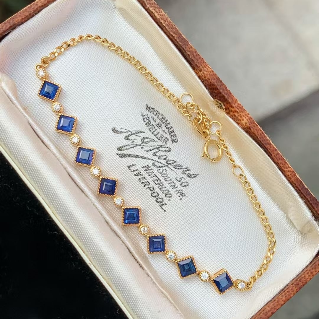 14k Gold 2.29 Ctw Natural Sapphire & Diamond Bracelet: Ref:230945037 // gold content:14k gold // main gemstone:sapphire // shape:square // carat weight:2. 15ct // color:blue // treatment:natural // // adjacent gemstone 2 : diamond // shape:round //