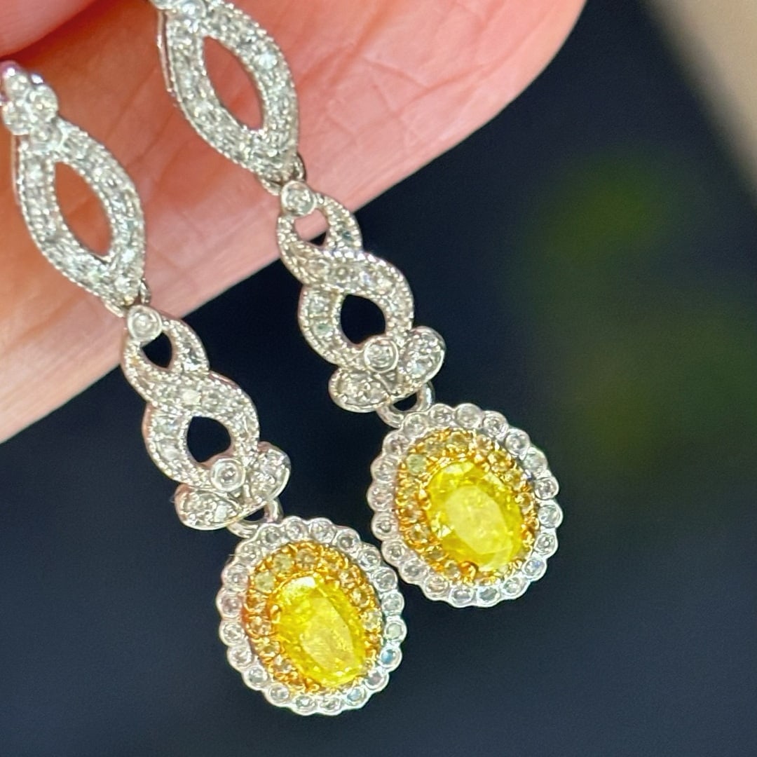 14k Gold 0.8 Ctw Natural Yellow Diamond & Diamond Earrings: Ref:230945057 // gold content:14k gold // main gemstone:yellow diamond // shape:oval // carat weight:0. 5ct // color:yellow // treatment:natural // // adjacent gemstone 2 : diamond // shape:round // c