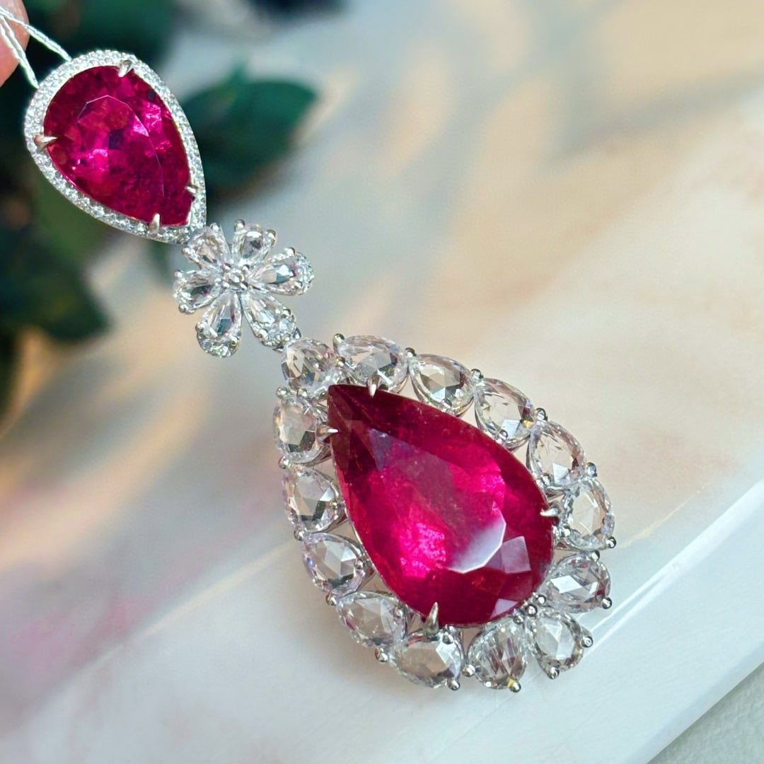14k Gold 8.1 Ct Natural Tourmaline & Sapphire & Diamond Pendant( Without Chain ): Ref:230945066 // gold content:14k gold // main gemstone:tourmaline // shape:pear // carat weight:8. 1ct // color:red // treatment:natural // // adjacent gemstone 2 : sapphire // shape:pear // color:wh