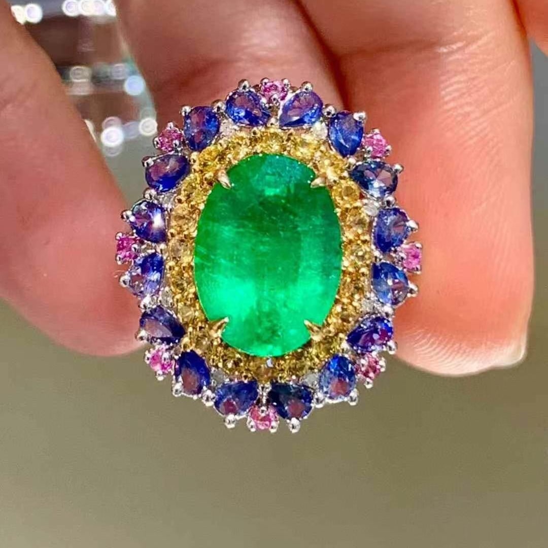 14k Gold 3.35 Ct Natural Emerald & Sapphire Ring: Ref:230945076 // gold content:14k gold // ring size:7. 25us // // main gemstone:emerald // shape:oval // carat weight:3. 35ct // color:green // treatment:natural // // adjacent gemstone 2 :