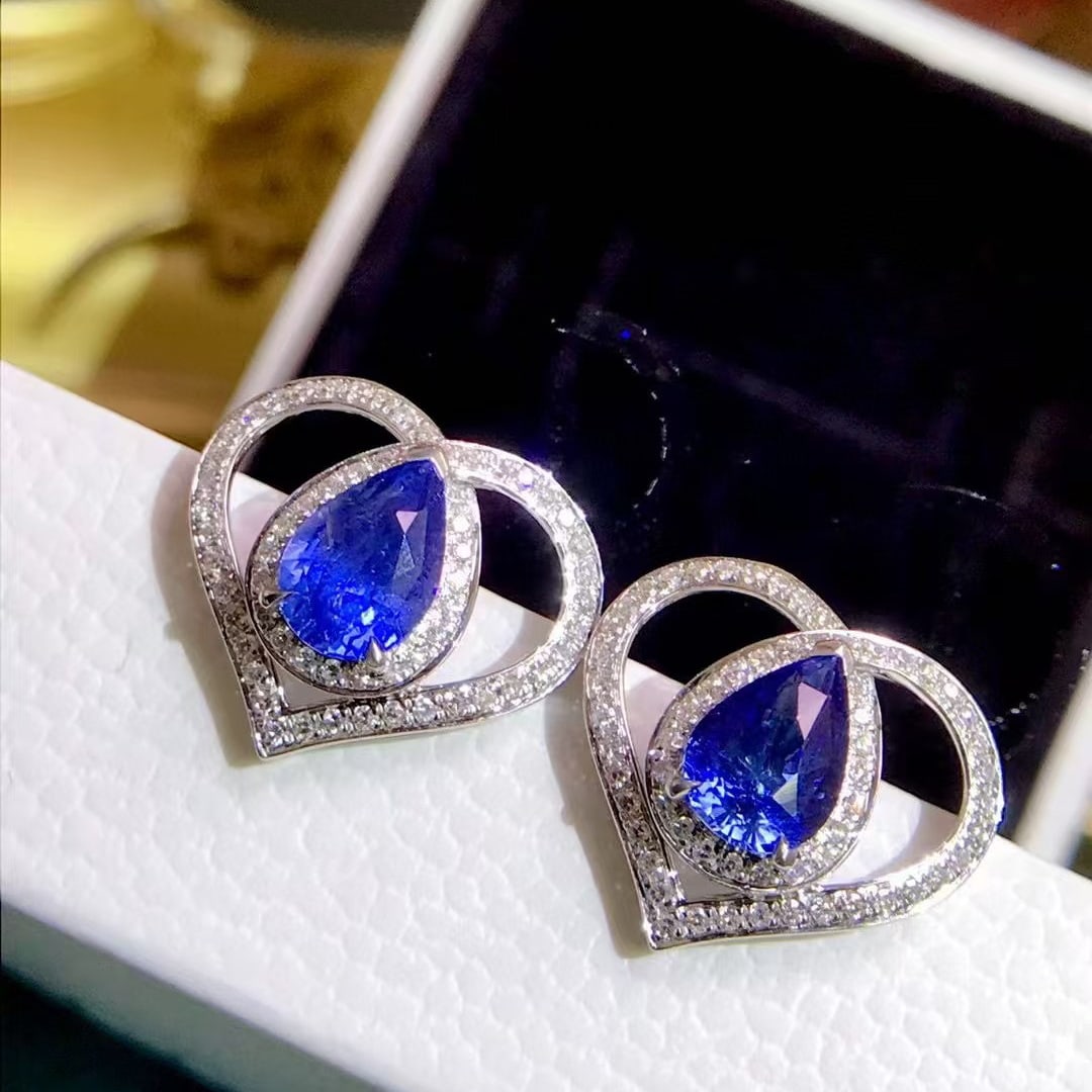 14k Gold 2.61 Ctw Natural Sapphire & Diamond Earrings: Ref:230945083 // gold content:14k gold // main gemstone:sapphire // shape:pear // carat weight:2. 15ct // color:cornflower blue // treatment:natural // // adjacent gemstone 2 : diamond // shape:round