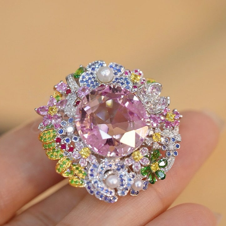 14k Gold 12.5 Ct Natural Tourmaline Ring: Ref:230945145 // gold content:14k gold // ring size:7. 25us // // main gemstone:tourmaline // shape:oval // carat weight:12. 5ct // color:pink // treatment:natural // High Estimate: 35000 Condition: