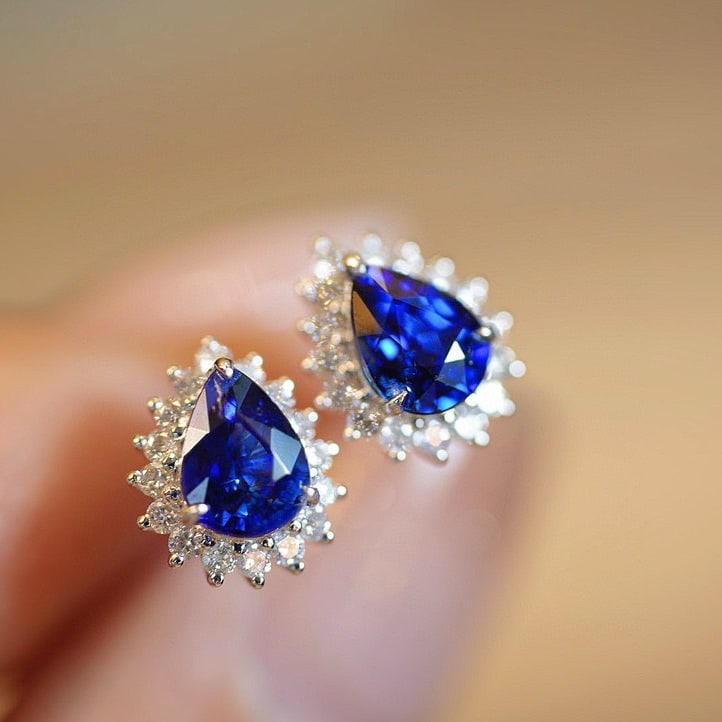 14k Gold 1.3 Ct Natural Sapphire & Diamond Earrings: Ref:230945155 // gold content:14k gold // main gemstone:sapphire // shape:pear // carat weight:1. 3ct // color:blue // treatment:natural // // adjacent gemstone 2 : diamond // shape:round // clarity g
