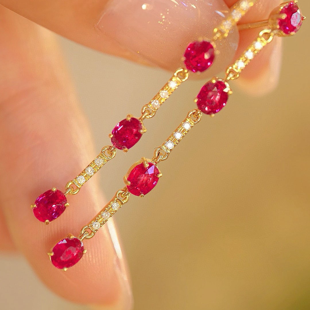 14k Gold 2 Ct Natural Ruby & Diamond Earrings: Ref:230945164 // gold content:14k gold // main gemstone:ruby // shape:oval // carat weight:2ct // color:red // treatment:natural // // adjacent gemstone 2 : diamond // shape:round // clarity