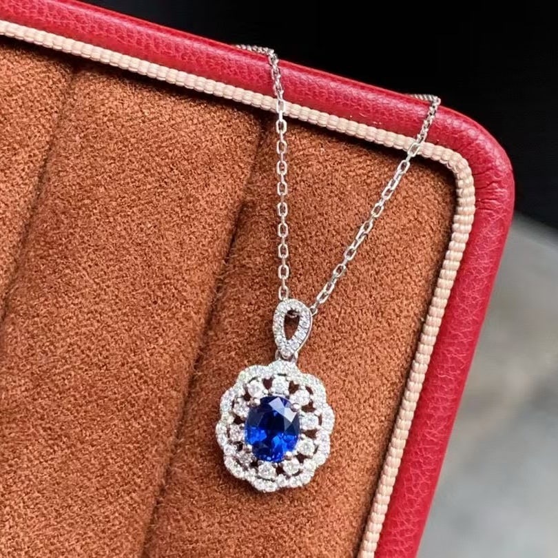 14k Gold 0.82 Ctw Natural Sapphire & Diamond Pendant( Without Chain ): Ref:230945208 // gold content:14k gold // main gemstone:sapphire // shape:oval // carat weight:0. 6ct // color:royal blue // treatment:natural // // adjacent gemstone 2 : diamond // shape:round // car
