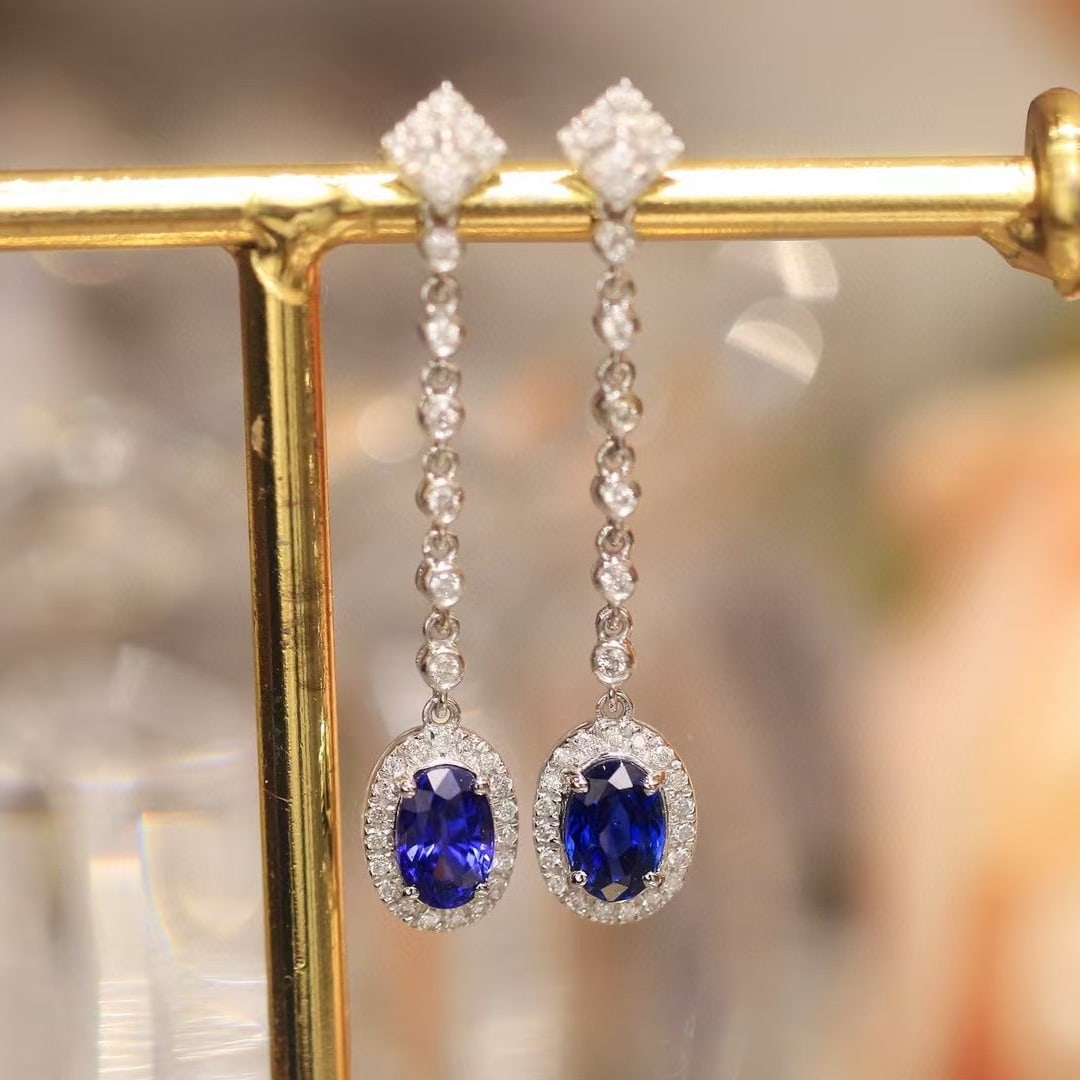 14k Gold 1.53 Ctw Natural Sapphire & Diamond Earrings: Ref:230945209 // gold content:14k gold // main gemstone:sapphire // shape:oval // carat weight:1. 25ct // color:royal blue // treatment:natural // // adjacent gemstone 2 : diamond // shape:round //