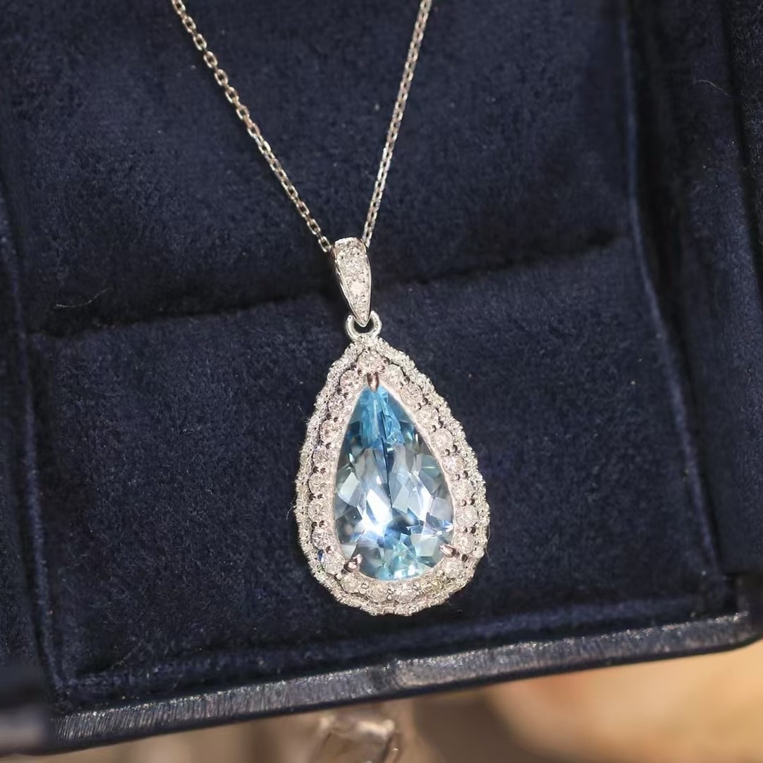 14k Gold 3.41 Ctw Natural Aquamarine & Diamond Pendant( Without Chain ): Ref:230945217 // gold content:14k gold // main gemstone:aquamarine // shape:pear // carat weight:2. 75ct // color:santa maria color // treatment:natural // // adjacent gemstone 2 : diamond //