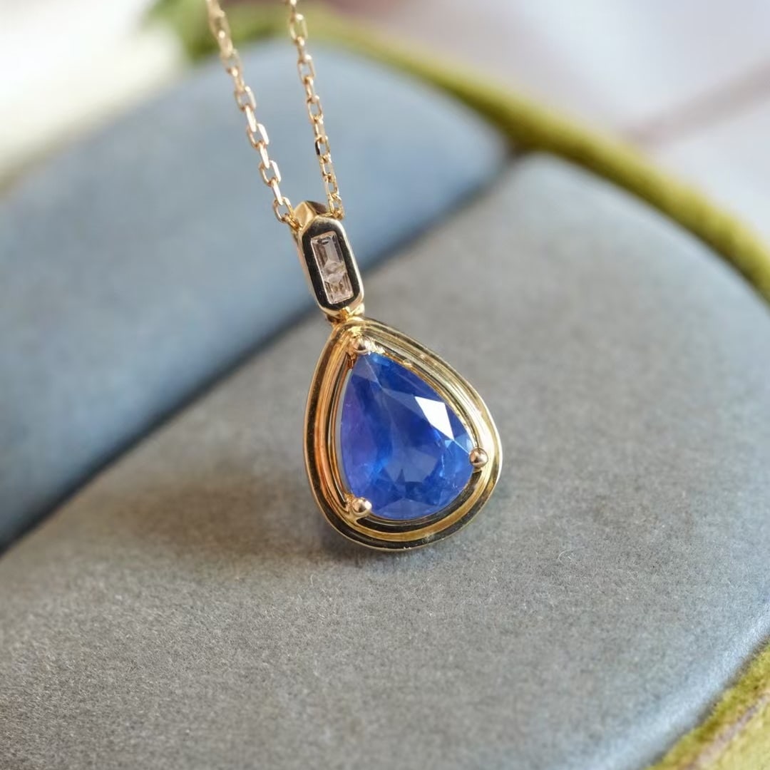 14k Gold 1.4 Ct Natural Sapphire Pendant( Without Chain ): Ref:230945255 // gold content:14k gold // main gemstone:sapphire // shape:pear // carat weight:1. 4ct // color:blue // treatment:natural // Low Estimate: 3300Condition: NewHigh Estimate: 5000