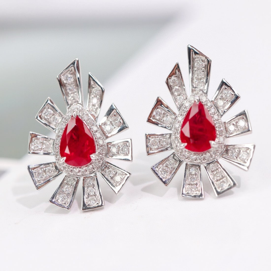 14k Gold 1.61 Ctw Natural Ruby & Diamond Earrings: Ref:230946027 // gold content:14k gold // main gemstone:ruby // shape:pear // carat weight:1. 2ct // color:pigeonblood red // treatment:natural // // adjacent gemstone 2 : diamond // shape:round //