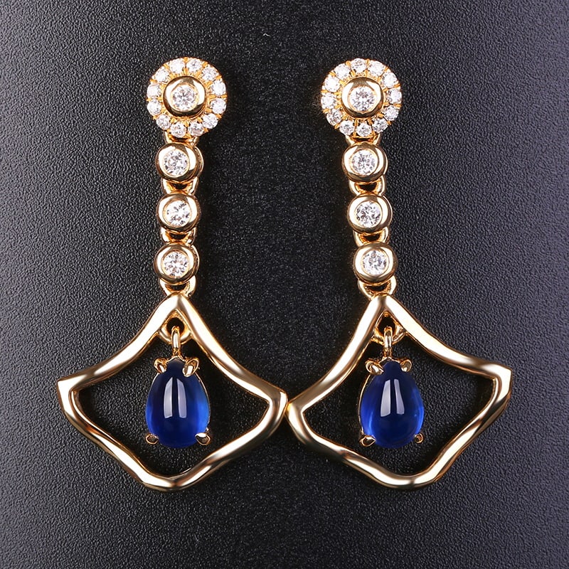 14k Gold 1.80 Ctw Natural Sapphire & Diamond Earrings: Ref:230946030 // gold content:14k gold // main gemstone:sapphire // shape:pear // carat weight:1. 52ct // color:blue // treatment:natural // // adjacent gemstone 2 : diamond // shape:round // carat