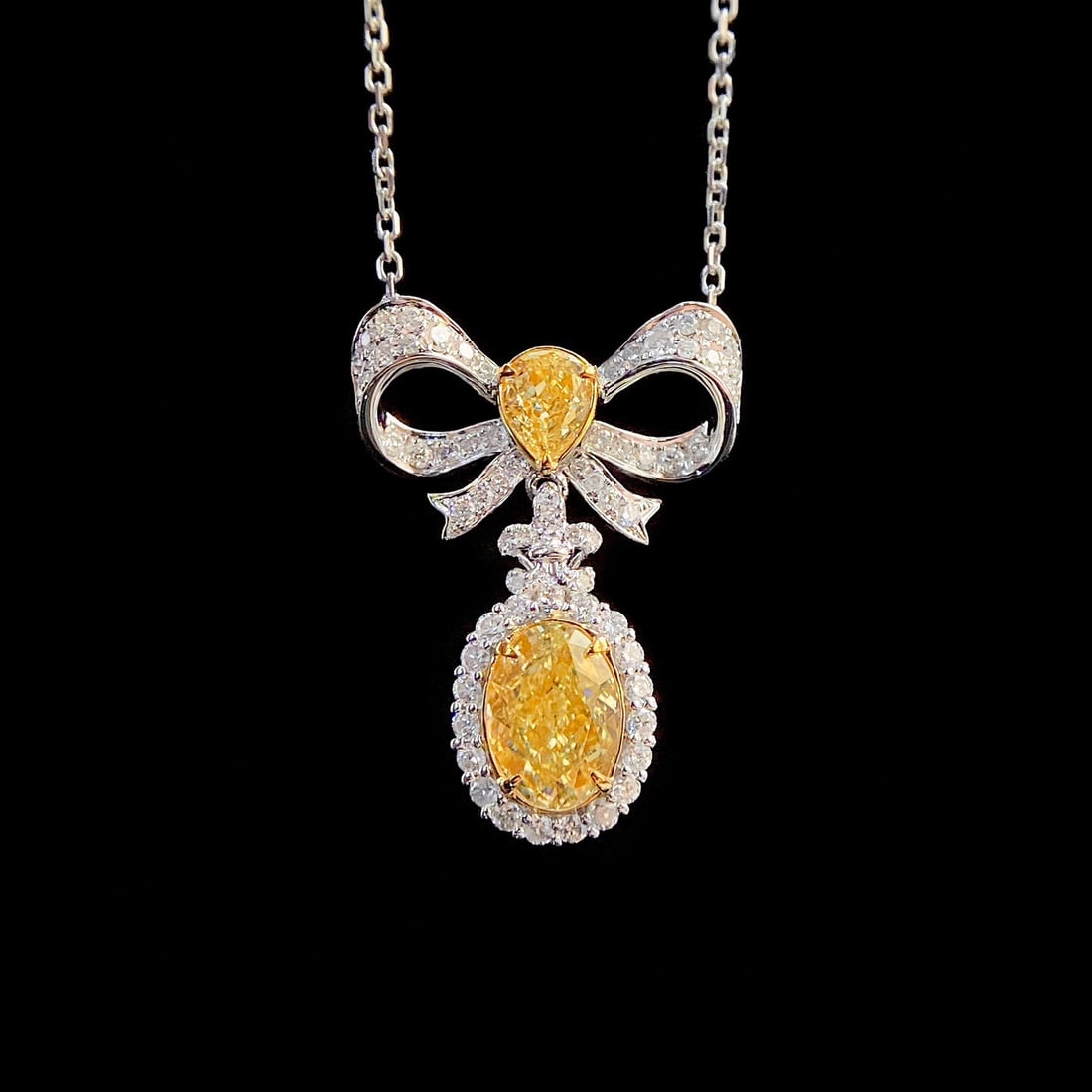 14k Gold 1.51 Ctw Natural Yellow Diamond & Diamond Necklace: Ref:230946047 // gold content:14k gold // main gemstone:yellow diamond // shape:oval // carat weight:1. 05ct // color:yellow // treatment:natural // // adjacent gemstone 2 : diamond // shape:round