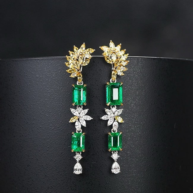 14k Gold 3.63 Ctw Vivid Green Natural Emerald & Sapphire Earrings: Ref:230946106 // gold content:14k gold // main gemstone:emerald // shape:octagonal // carat weight:2. 65ct // color:vivid green // treatment:natural // // adjacent gemstone 2 : sapphire // shape:marqu