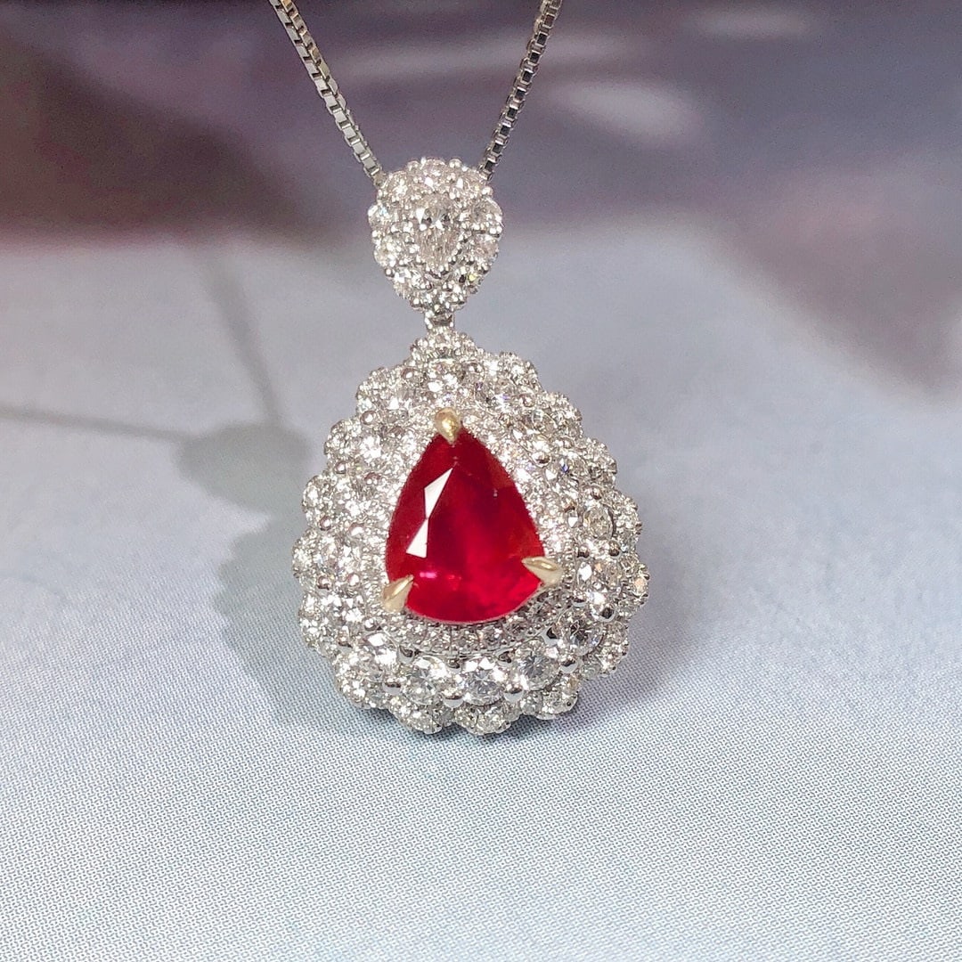 14k Gold 1.75 Ctw Natural Ruby & Diamond Pendant( Without Chain ): Ref:230946128 // gold content:14k gold // main gemstone:ruby // shape:pear // carat weight:0. 94ct // color:pigeonblood red // treatment:natural // // adjacent gemstone 2 : diamond // shape:round // c