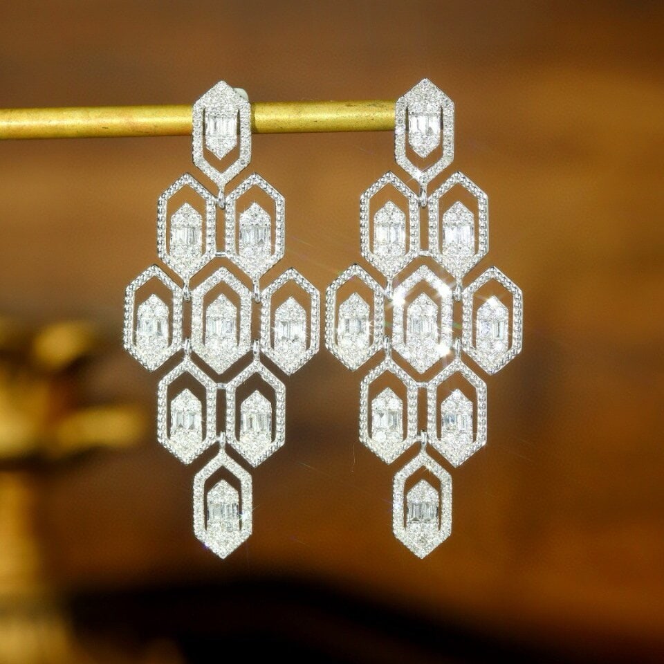 14k Gold 0.80 Ct Natural H Diamond Earrings: Ref:230946187 // gold content:14k gold // main gemstone:diamond // shape:multiply // carat weight:0. 80ct // clarity grade:vs-si // color:h // treatment:natural // Condition: NewLow Estimate: