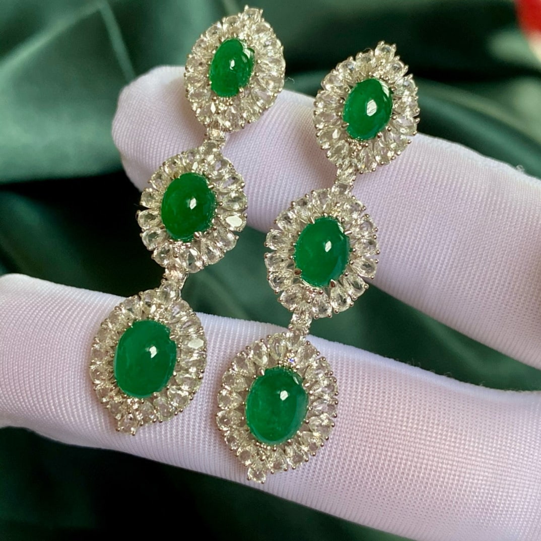 14k Gold 13.02 Ctw Vivid Green Natural Emerald & Sapphire Earrings: Ref:230946282 // gold content:14k gold // main gemstone:emerald // shape:oval // carat weight:6. 02ct // color:vivid green // treatment:natural // // adjacent gemstone 2 : sapphire // shape:pear //
