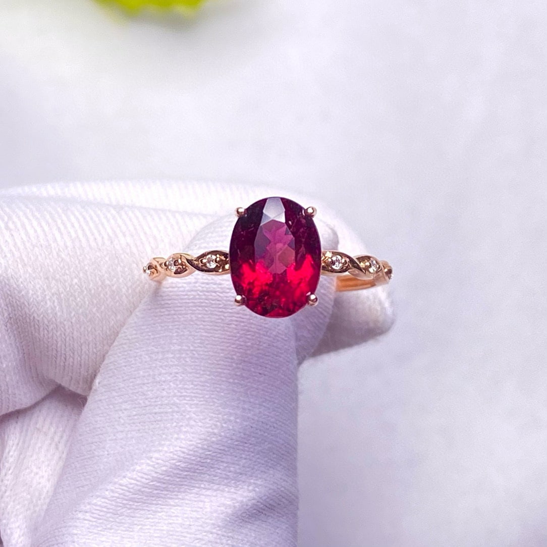 14k Gold 1.66 Ct Natural Tourmaline & Diamond Ring: Ref:230946287 // gold content:14k gold // ring size:7. 25us // // main gemstone:tourmaline // shape:oval // carat weight:1. 66ct // color:red // treatment:natural // // adjacent gemstone 2 :