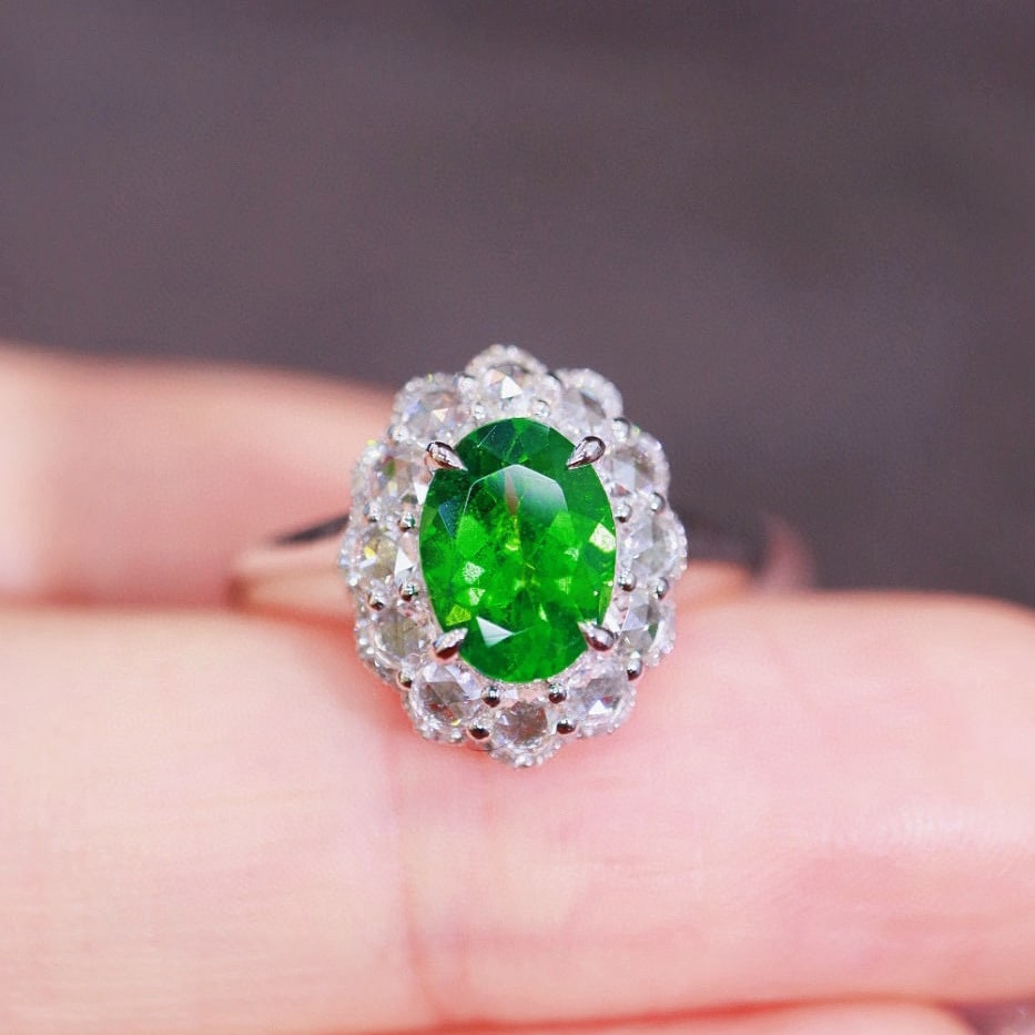 14k Gold 1.73 Ctw Natural Tsavorite & Diamond Ring: Ref:230946329 // gold content:14k gold // ring size:7. 25us // // main gemstone:tsavorite // shape:oval // carat weight:1. 25ct // color:green // treatment:natural // // adjacent gemstone 2 :