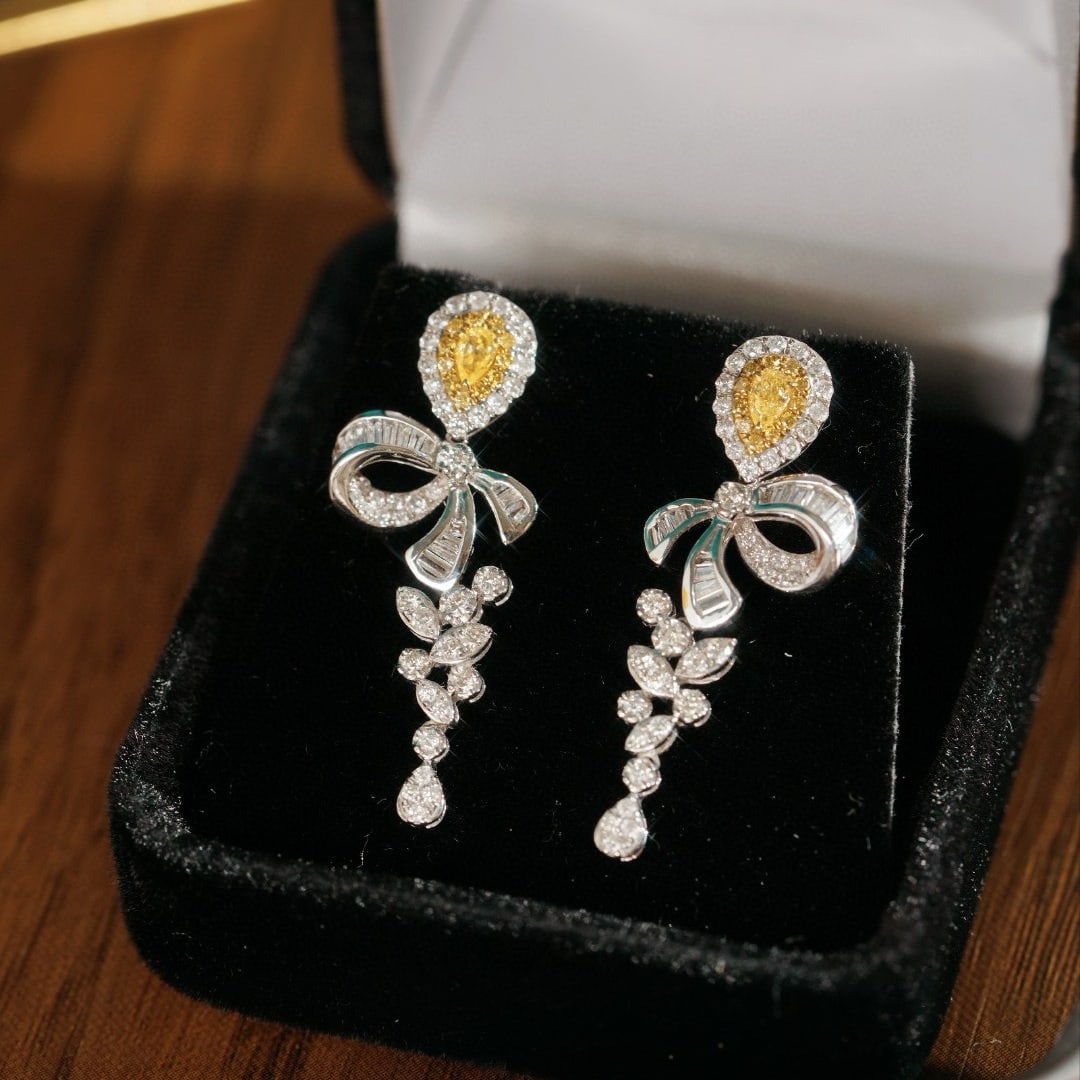 14k Gold 1.20 Ctw Natural Yellow Diamond & Diamond Earrings: Ref:230946330 // gold content:14k gold // main gemstone:yellow diamond // shape:pear // carat weight:0. 26ct // color:yellow // treatment:natural // // adjacent gemstone 2 : diamond //