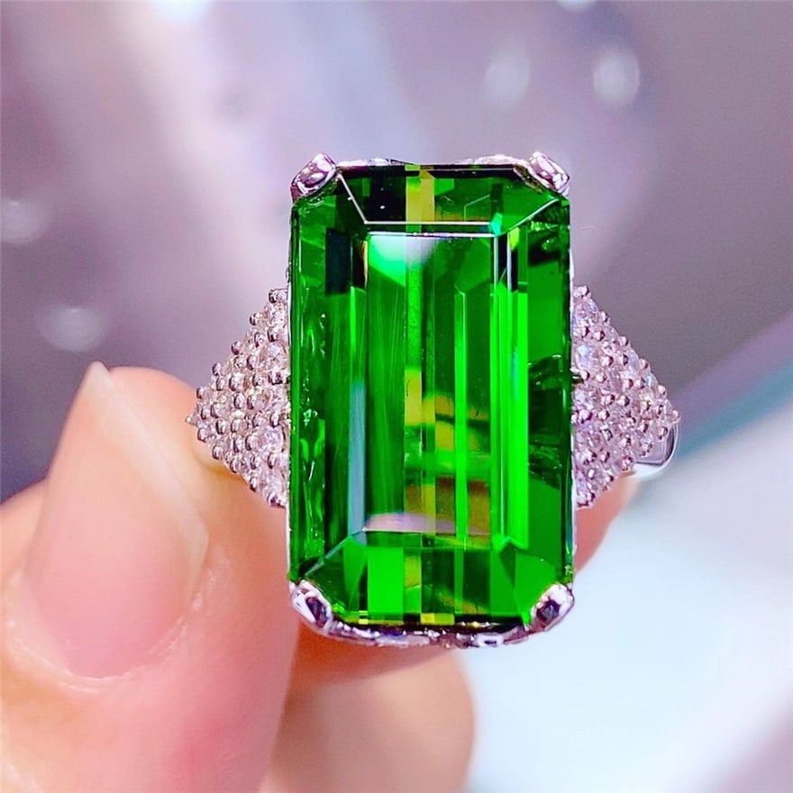 14k Gold 15.3 Ct Natural Tourmaline & Diamond Ring: Ref:230947014 // gold content:14k gold // ring size:7. 25us // // main gemstone:tourmaline // shape:octagonal // carat weight:15. 3ct // color:green // treatment:natural // // adjacent gemstone 2 : di
